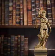 Law theme, mallet of the judge, justice scale, books, wooden des