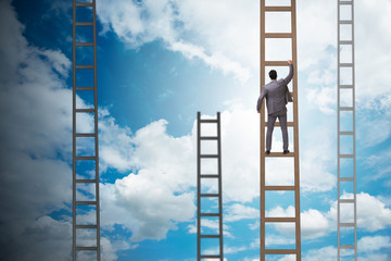 Young businessman climbing career ladder