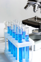 Laboratory, chemistry and science concept on white background