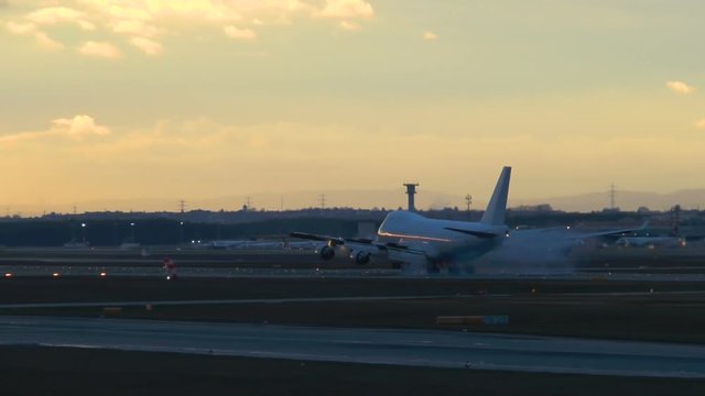 Landing airplane - Frankfurt airport at dusk
