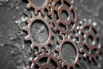 concept hour metal gears on dark background top view