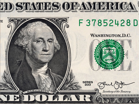 US president George Washington on USA one dollar bill close up, USA federal fed reserve note. American dollar is the official currency of the United States of America.