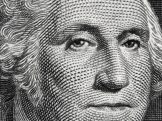 US president George Washington face portrait on the USA one dollar bill macro, united states money closeup
