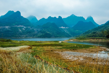 The mountains and rural scenery in the mist 