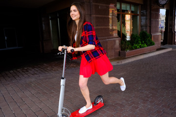 Fototapeta na wymiar woman travelling by scooter