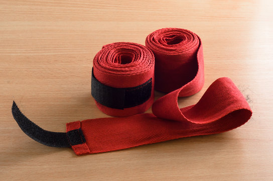 boxer wrist wraps on wooden background