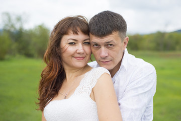 Fototapeta premium Lovers man and woman on a date in nature.