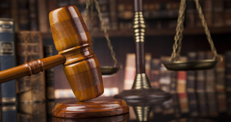 Law and justice concept, Brown wooden background, beautiful refl