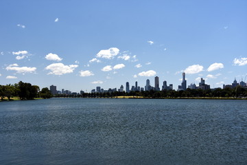 Fototapeta na wymiar Melbourne city (Australia) skyscrapers viewed across Albert Park Lake.