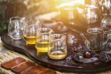 tea time, vintage tea set maker on wooden tea tray with teapot in antique Chinese style