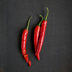 Chili peppers on a black background