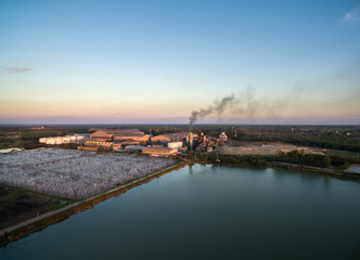 Fototapeta na wymiar aerial view from drone sugar factory with Waste Water Treatment