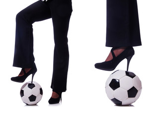 Woman with football on white