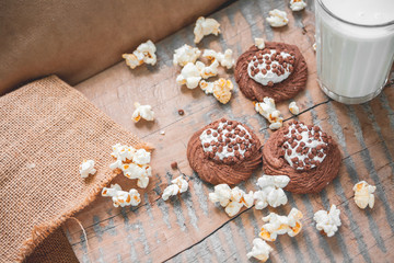 Obraz na płótnie Canvas Milkshake with chocolate baking, popcorn