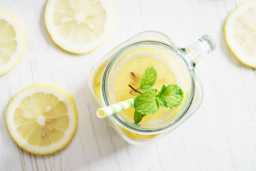 lemonade in jar with green straw