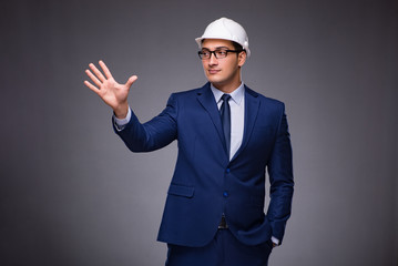 Young architect in industrial concept