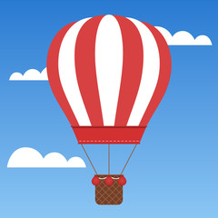 Beautiful red hot air balloon traveling around the world.