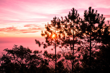 Fototapeta na wymiar Beautiful sunrise with amazing colors at mountain Doi Mon Lan, Chiang Mai, Thailand, wonderful background, romantic landscape