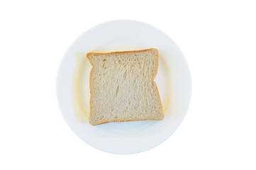 Close-up one slice of white bread on the plate, isolated on whit