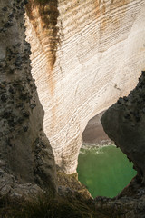 Dizzying view from the high cliffs down to the sea, amazing and fabulous cliff at Etretat, beautiful background