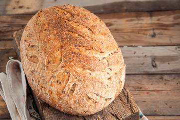 Freshly baked sourdough organic bread with flax seeds