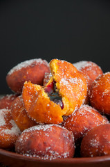 Pumpkin berliner donuts withs jam galzed with sugar