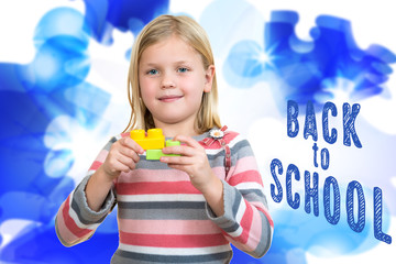 Little girl with a toy, Isolated on white