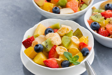 assortment of fresh fruit salads, closeup