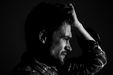 young man, sad emotions, black and white photography