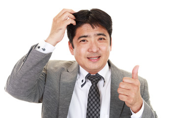 ガッツポーズのビジネスマン
