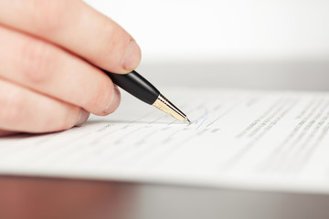 Business woman signing contract