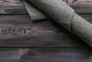 burlap texture on wooden background