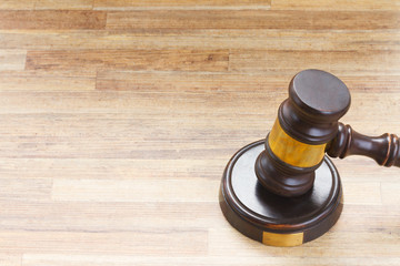 One Wooden Law Gavel, copy space on wooden table desktop background