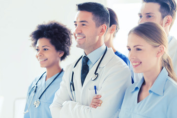 group of happy doctors at hospital