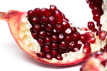 cut pomegranate with seeds