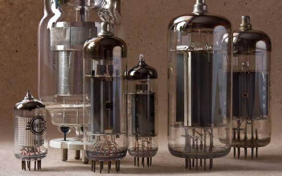 macro shot of vintage radio lamps on kraft paper background.