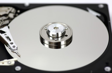 Harddisk drive (HDD) with top cover open isolated on white background