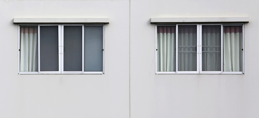 Fototapeta premium Windows at the concrete wall