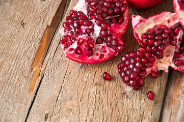 Pomegranate on a wooden background