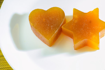 Candied fruit jelly apricot in the form of heart and star of David