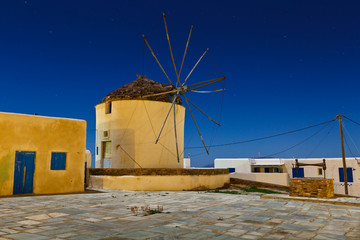 Fototapeta na wymiar Windmill in the main village on Ios island.