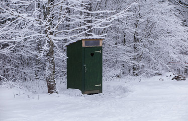 Outdoor toilet in winter