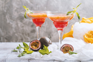 Alcoholic cocktail with fresh passion fruit