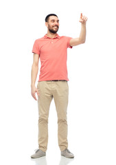 Fototapeta premium happy man touching something imaginary