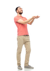 happy man holding something imaginary on hands