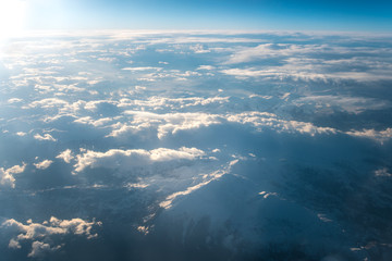The picturesque cloud view on the background of bright sun