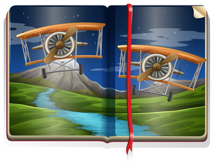 Book with scene of planes flying over river
