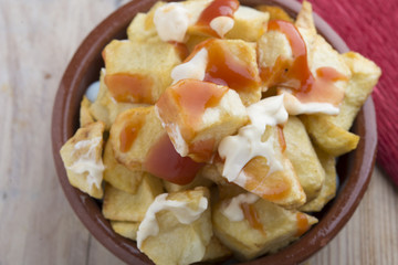 Tapa typical spain Patatas bravas