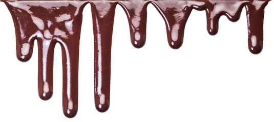 Flowing chocolate drops or drops of chocolate glaze.