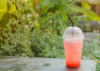 Strawberry soda on nature background